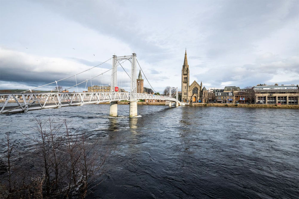 The suspension foot bridge into the town centre